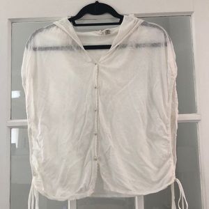 Lightweight sleeveless open cream top with tues